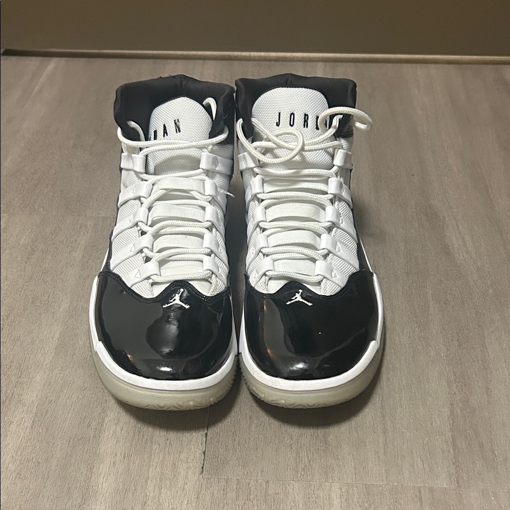Jordan Men's Black and White High-Top Sneakers